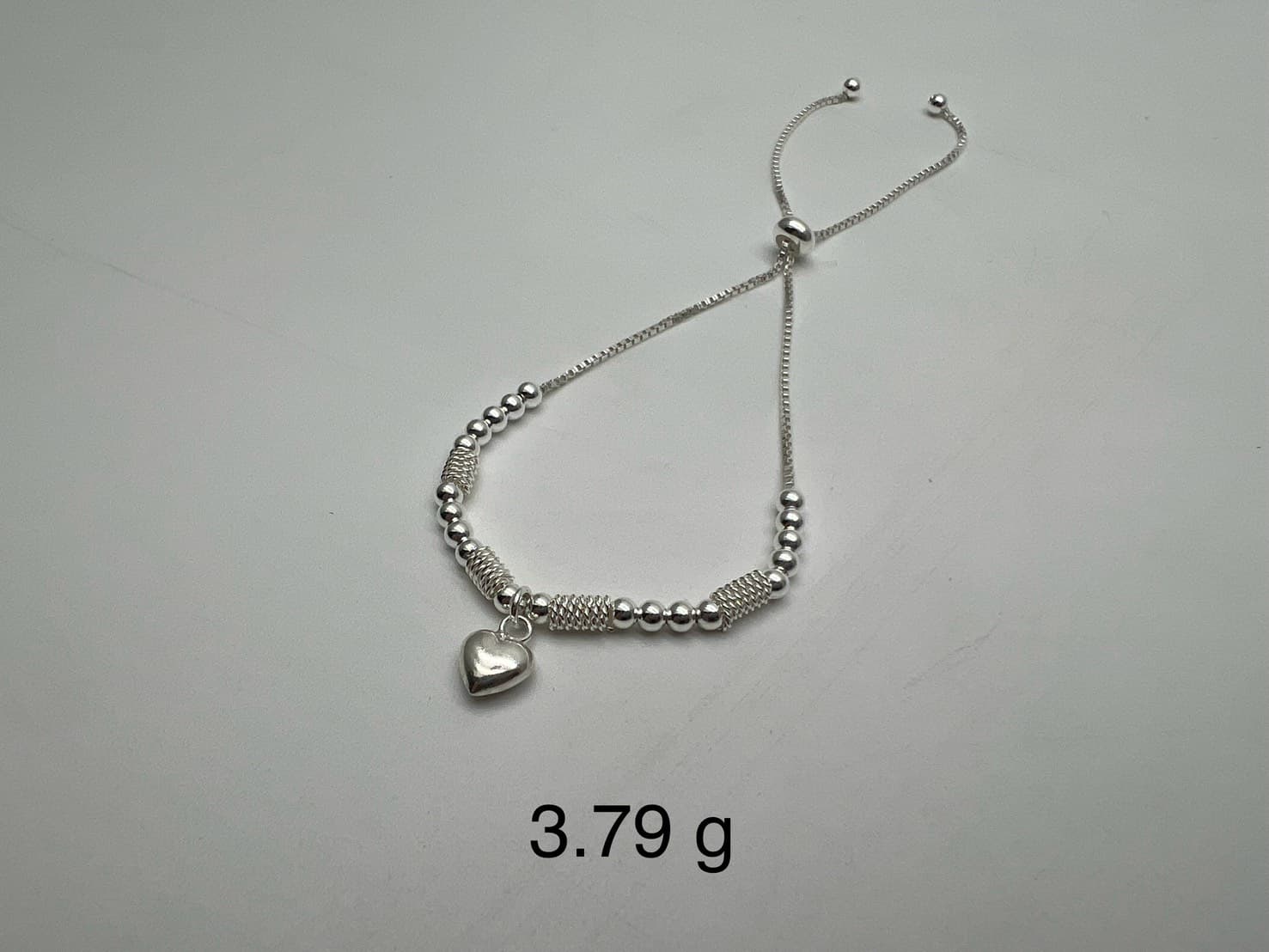 สร้อยข้อมือเงินแท้ปรับระดับชาร์มหัวใจ